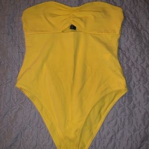 yellow bodysuit